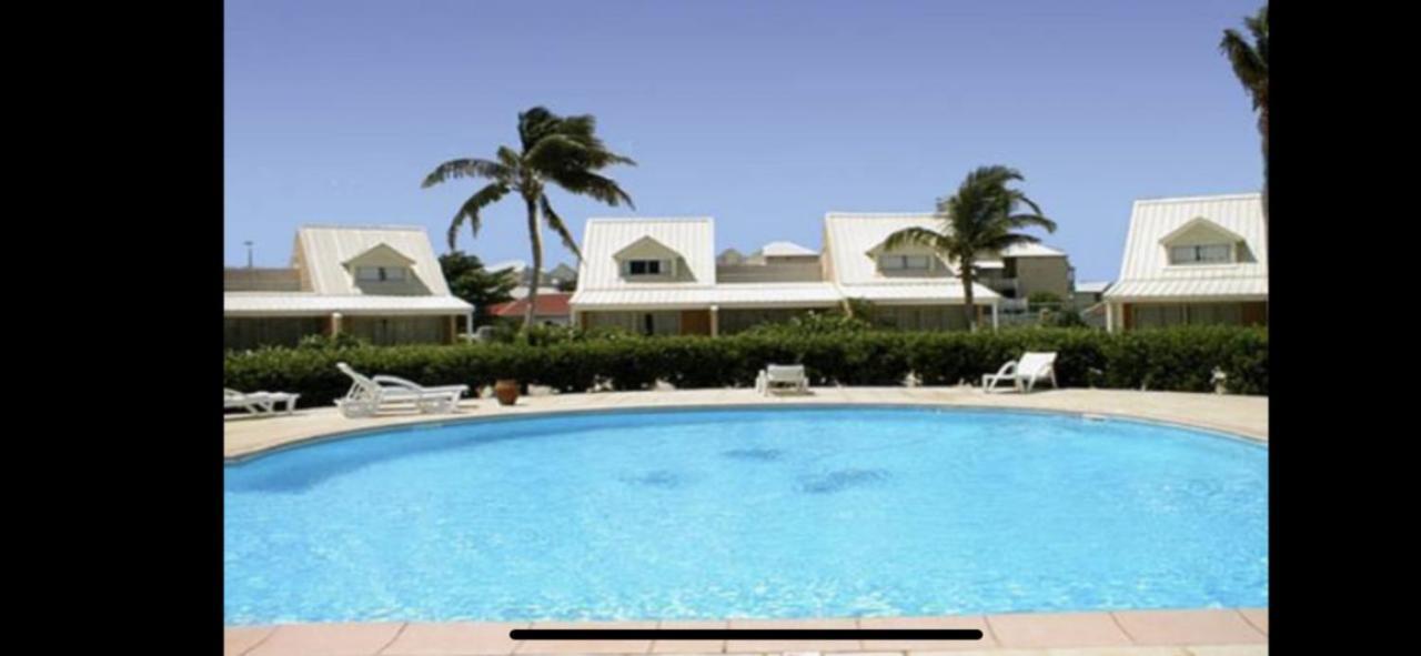 Coco Beach Sandy Ground Bagian luar foto